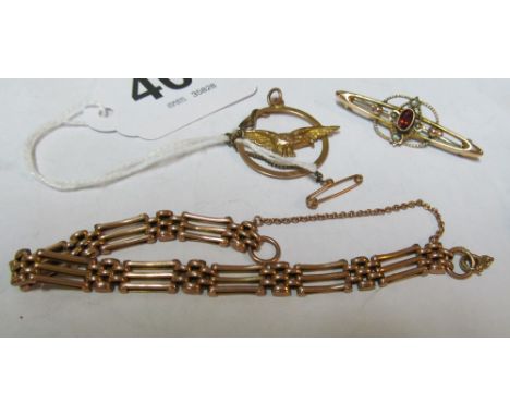 A 9ct gate link bracelet 6.2gm, 9ct Edwardian brooch set seed pearls and garnet 2.15gm and 9ct circular pendant with eagle 1.
