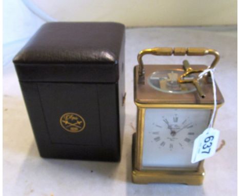 A brass carriage clock striking hour and half-hour (i.c)