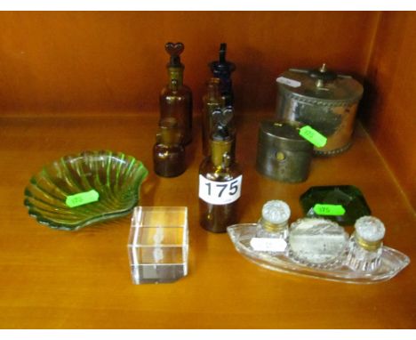 A glass inkwell with Cromer scene and glass chemist bottles