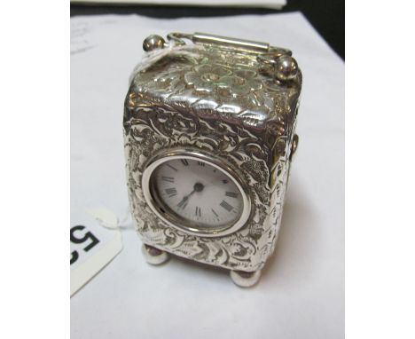 A Victorian silver case miniature travelling clock