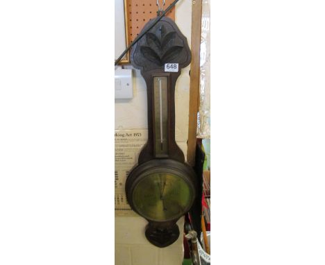 A brass face barometer