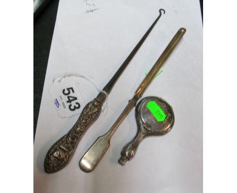 A silver handled button hook, plated compact and marrow scoop