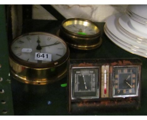 A 1920's table clock/barometer/thermometer (case worn) and two ship's style clocks