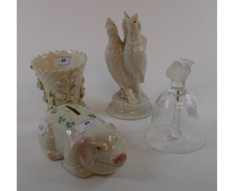 A Lalique glass bell, with bird finial, 13.5 cm high, a Belleek moneybox, in the form of a pig, and two similar vases (a.f.) 