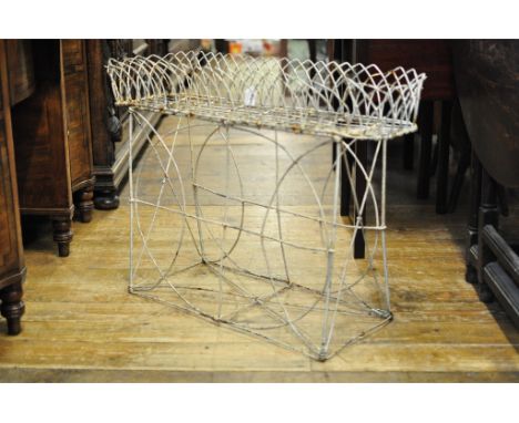 A Regency style painted wirework planter, 84 cm wide