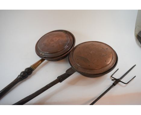 A French rotary spit, two copper warming pans, a set of three brass fire irons, pictures and other items (qty)