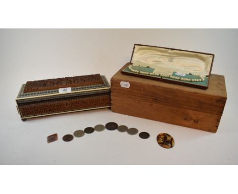 An Indian carved and inlaid box, 31 cm wide, with original packing box, a Queen Victoria crown, 1889, other coins, a Royal Cr