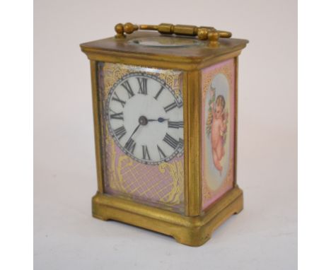 A porcelain mounted carriage clock, 11.5 cm high