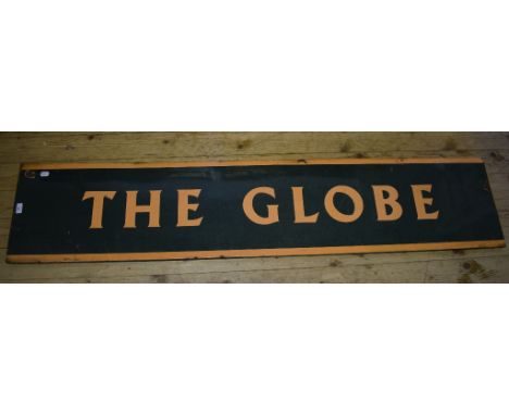 An enamel pub type sign, The Globe, on a green ground with orange lettering, 180 cm wide