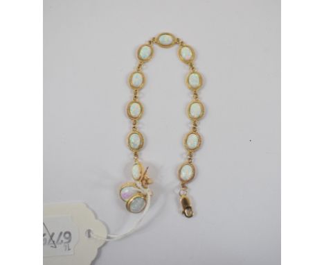 A 9ct gold and Gilson opal bracelet, with matching earrings