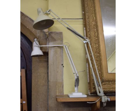 A white Herbert Terry anglepoise lamp, on a stepped base, and another lamp (2)