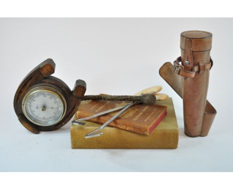 A leather hunting flask, a pair of boot pulls, an aneroid barometer in a horseshoe shaped oak case, Ward (Rowland) The Sports
