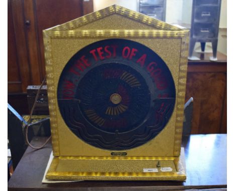 A Maryland Engineering Co illuminated and spinning shop display, The test of a good shop is to try it. Step in now., 36 cm wi