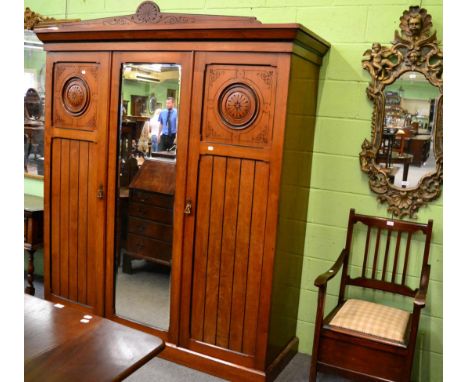 An Arts & Crafts wardrobe and a commode chair 