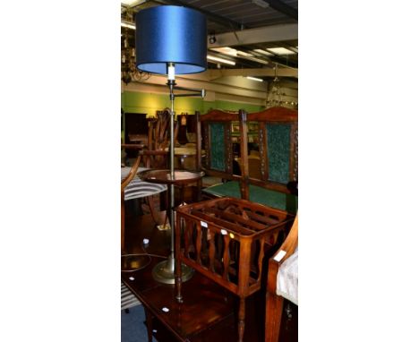 A 19th century mahogany four division Canterbury and an early 19th century brass adjustable lamp with circular tray shelf 