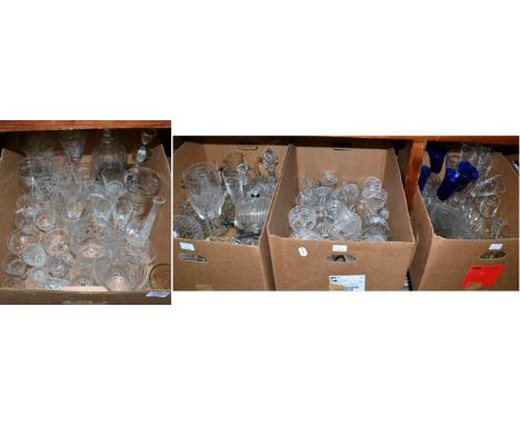 Four boxes of household glass including an etched Stuart Crystal jug, champagnes, decanters, plates, barrel form decanter on 