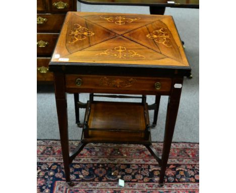 A 19th century inlaid rosewood envelope card table with a gallery shelf stretcher 