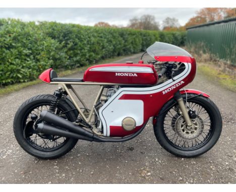 A modern homage to the legendary CR750, built with no expense spared. Styling based on the factory CR750 race bikes from the 