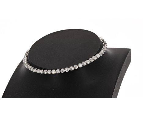 Modern 18ct white gold diamond line bracelet, round brilliant-cuts, estimated 2.30ct approx in total,&nbsp; 7.4gm, 7" long (6