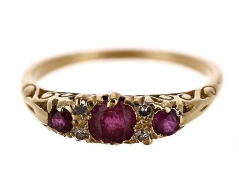 Pretty 18ct claw set ruby and diamond yellow gold ring, with three round rubies and four small diamonds, width 5.5mm, 3gm, ri