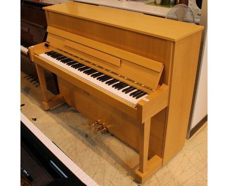 Kawai (c2003) A 114cm Model K-18B upright piano in a light wood case.