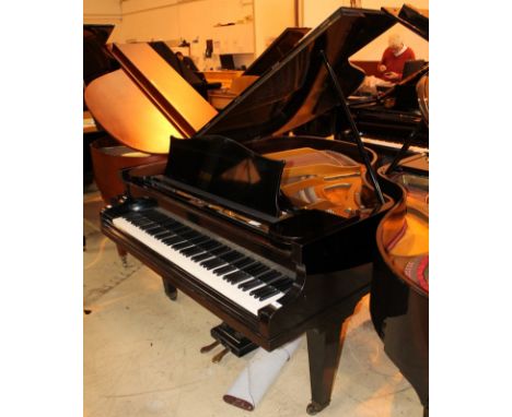 Bechstein (c1933) A 5ft 1in Model K grand piano in an ebonised case on square tapered legs; together with a stool. AMENDMENT 