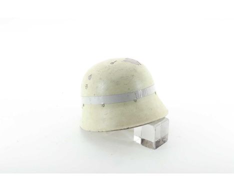 THIRD REICH STAHLHELM, CIRCA 1940  reputedly rescue services helmet used during the occupation of Jersey, painted white, stam