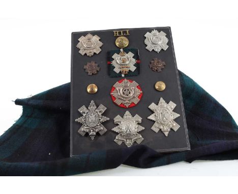 HIGHLAND LIGHT INFANTRY, COLLECTION OF CAP BADGES AND INSIGNIA, comprising twenty-four badges and other insignia, also two Gu