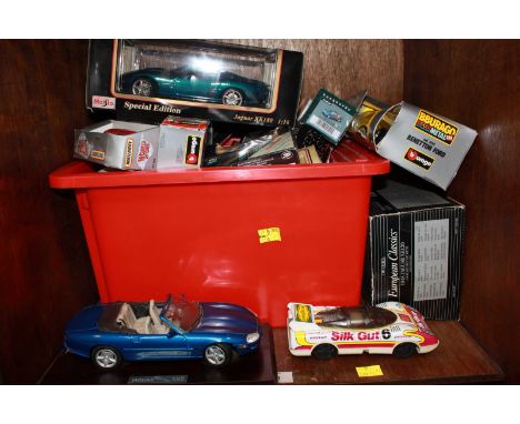 SECTION 53 & 54. A large collection of die cast model cars in various scales, mostly Jaguars.