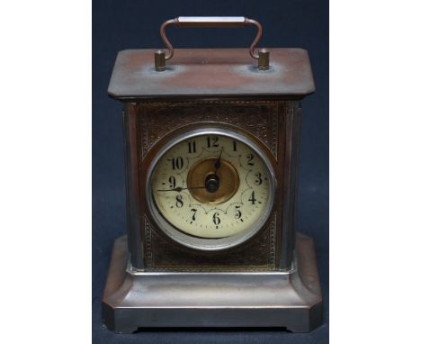 A late 19th century American musical mantle clock, with circular enamel dial and Arabic numerals. 14.75 cm high.