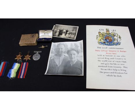 A WWII naval medal trio to Petty Officer Steward A. Batten, Royal Navy, together with Memorial Scrolls, photos and a 9ct gold