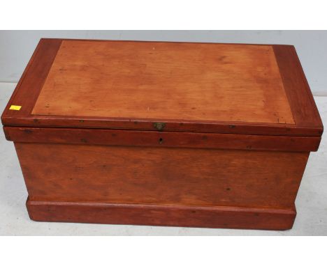 A Victorian mahogany and pine travelling trunk, with four internal secure storage spaces. 94 cm long.