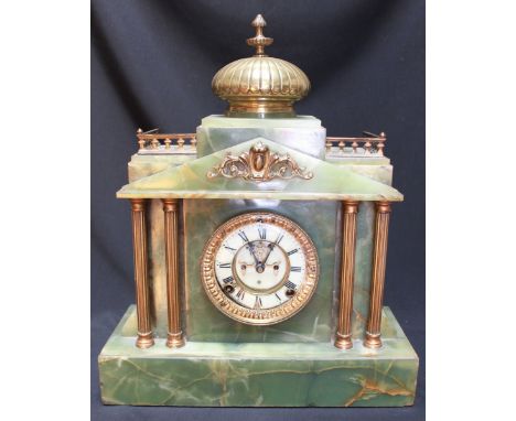 A Victorian green onyx architectural mantle clock, with brass domed top and gallery, with reeded columns to the front, the wh
