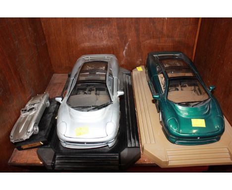 SECTION 55 & 56. A large collection of boxed die cast model cars in various scales, mostly Jaguars, including two large Jagua