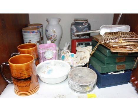 SECTION 19. A shelf of assorted items including a large truncheon, ceramics, evening bags and other items.