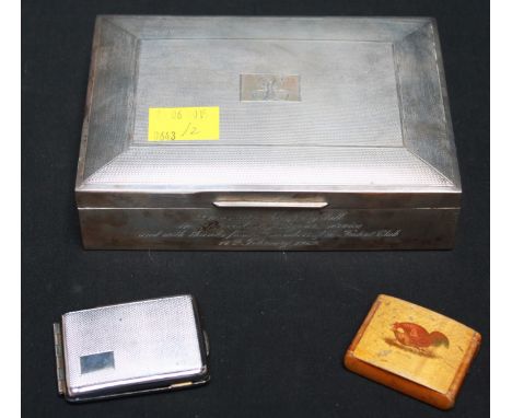 An engine turned silver cigarette box, hallmarked 1964, with long service inscription, together with a cockerel snuff box and