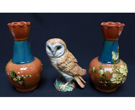 A pair of Exeter Art Potteries terracotta vases, 24.5 cm high, together with a Beswick model of a seated barn owl numbered 10