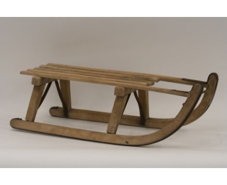 A vintage wooden sledge, 77cm