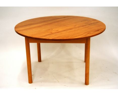 A light Ercol circular coffee table, 54cm high x 96cm dia. 