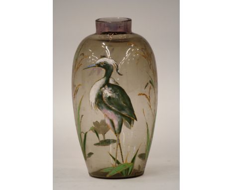 An Art Nouveau glass vase, with enamel decoration of a stork amongst foliage, 18cm 