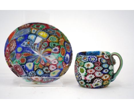 Fratelli Toso, an early 20th Century Murano Millefiore punch cup and saucer, 5.5cm high 