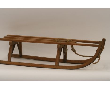 A vintage wooden sledge, 101cm