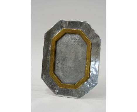 A chrome and brass easel photograph frame, 27cms