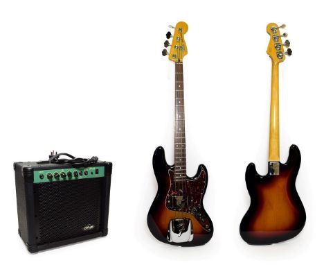 Fender Jazz Bass Guitar, sunburst finish, two pickups, three control dials, marbled scratchplate, rear of headstock 'Crafted 