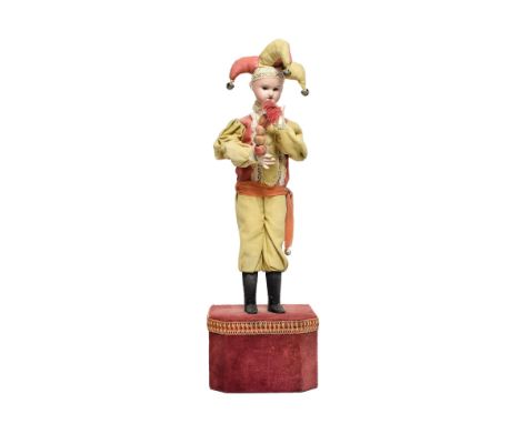 A Standing Jester Musical Automaton, the standing entertainer with traditional three-point headdress with bells, holding a ji