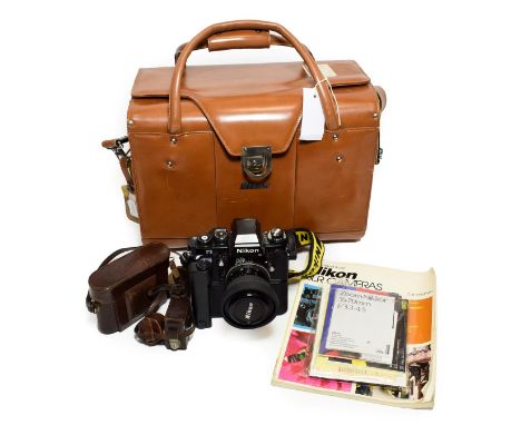 Nikon F3 Camera no.1622515 with motor drive and Nikkor f3.3-4.5 35-70mm lens and Nikon Series E f2.8 28mm lens; together with