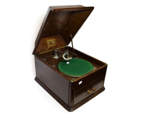 An HMV Model 9 Gramophone, with HMV No. 2 soundbox, gooseneck tonearm, large gilt transfer, 12-inch turntable, louvres behind