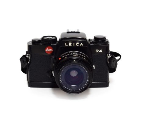 Leica R4 Camera no.1576899 with Wetzlar Elmarit-R f2.8 35mm lensLens has black spec in internally in centre of lens, camera c
