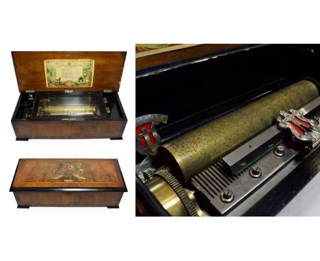 A Musical Box Playing Ten Airs, By Bremond, serial No. 670075, playing a selection of music-hall, operatic and Imperial music