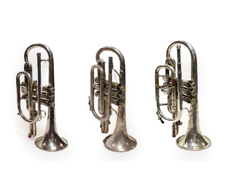 Three Cornets (i) Boosey &amp; Co. Solbron Class A no.102867 (cased) (ii) Barratts Signature Model no.C5774 (iii) Huttl Conco
